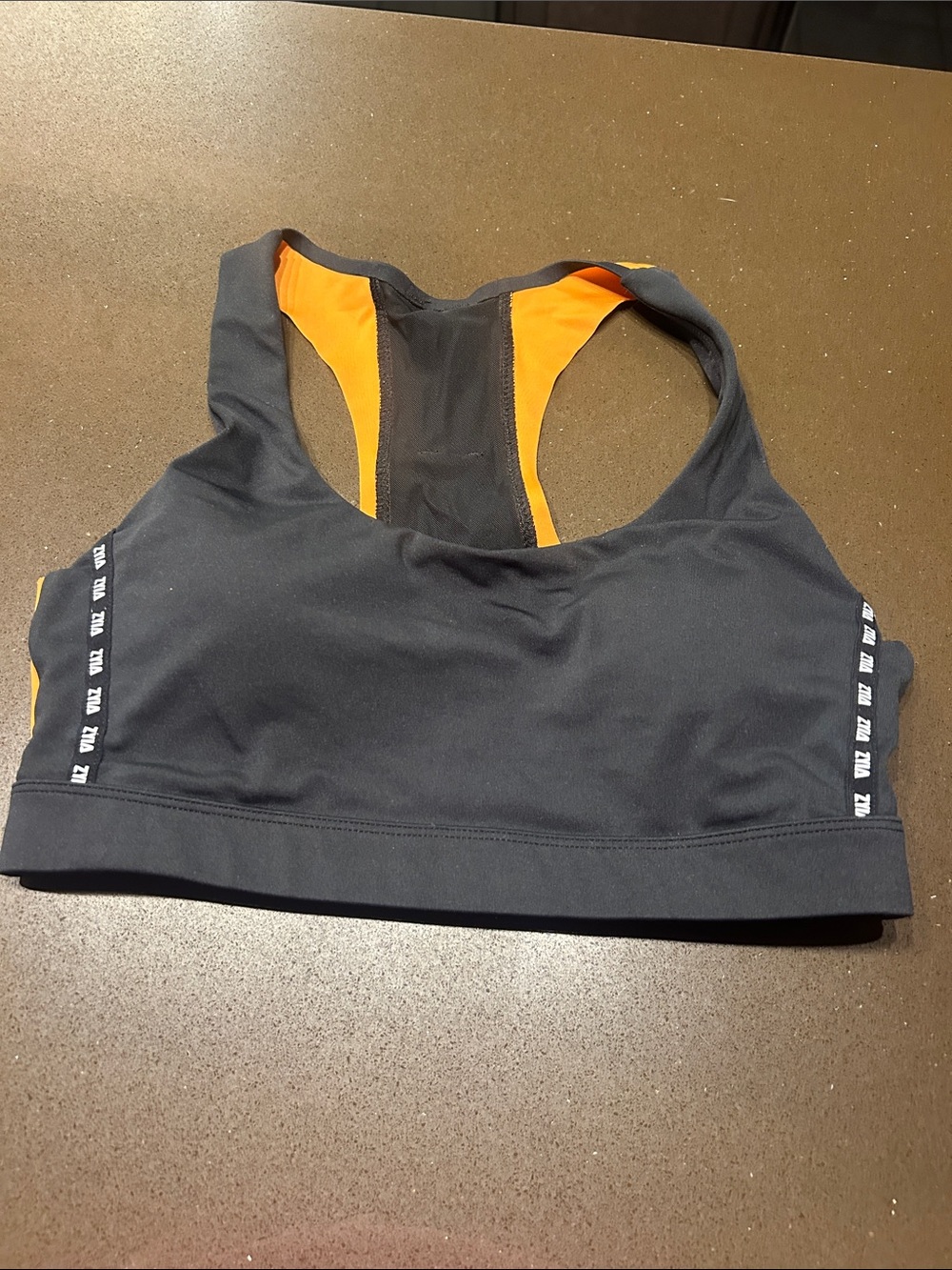 Racerback Performance Sports Bra in Black with Orange Accents